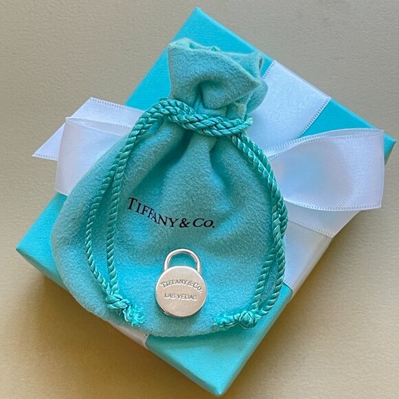 Tiffany & Co. Jewelry - Tiffany & Co. Lock Charm Las Vegas Silver Round with Pouch and Box